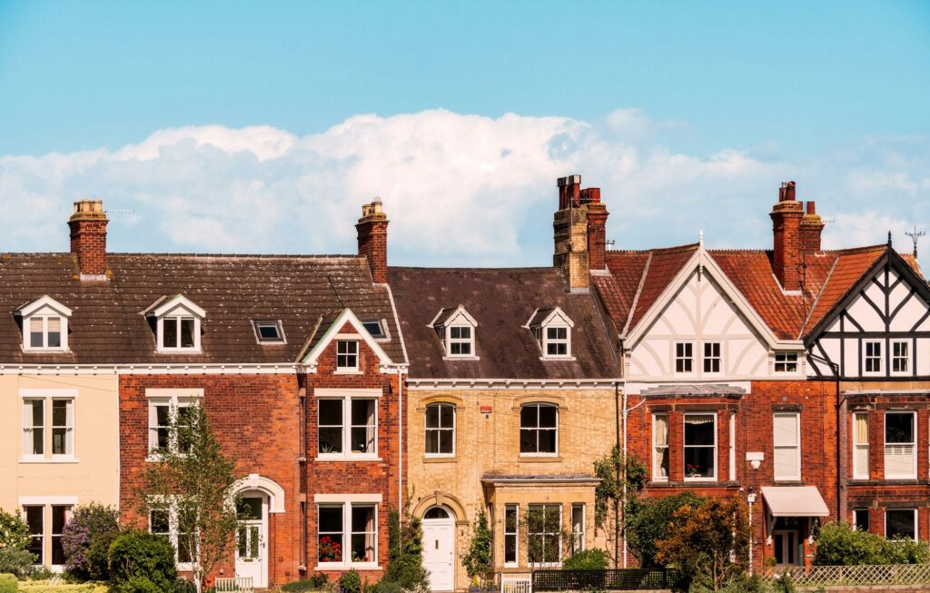 Beautiful shot of old brick houses in a row on a sunny day in England