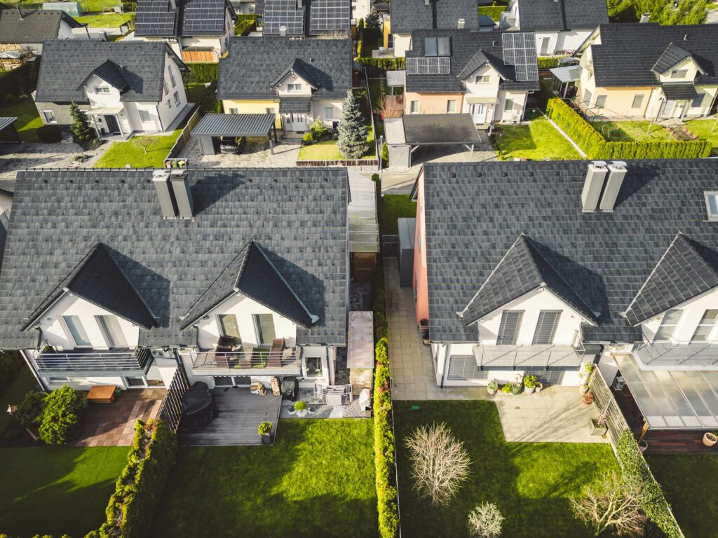 Looking down at the courtyard of duplex family homes in the suburbs